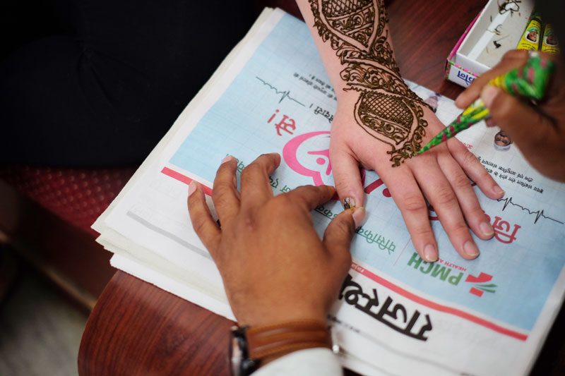 henna tattoo being done - India career break travel tips