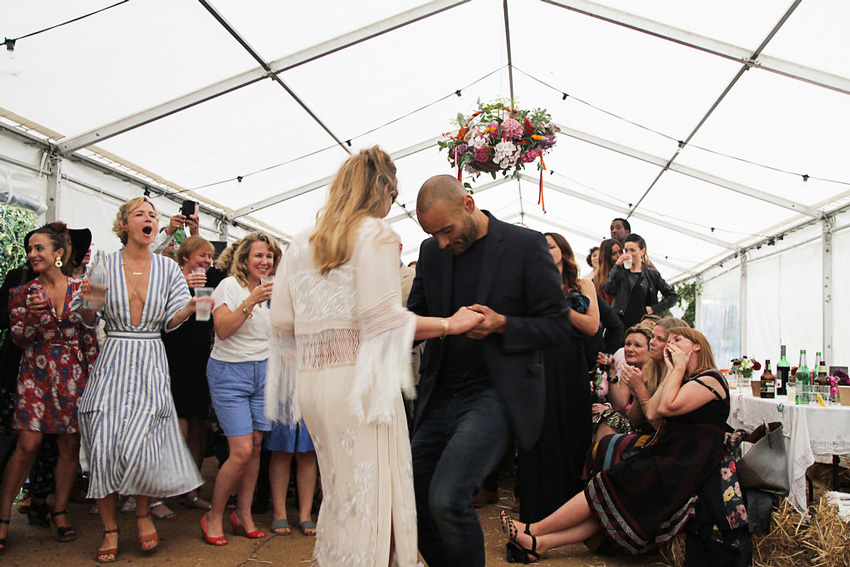 couple dancing at their crowdsourced DIY wedding