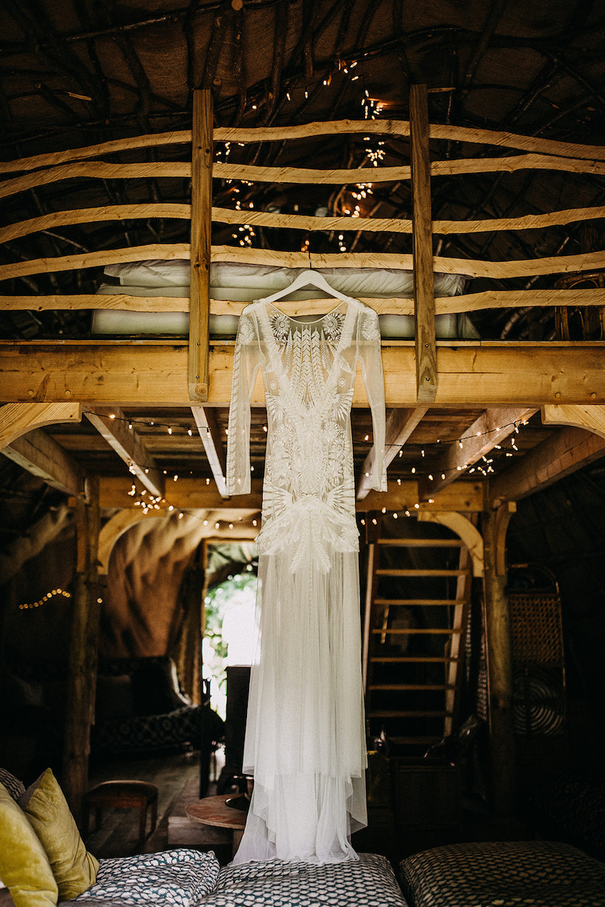 Bride's gown hanging in the Wren's Nest, at the Fire Pit Camp, Norwich
