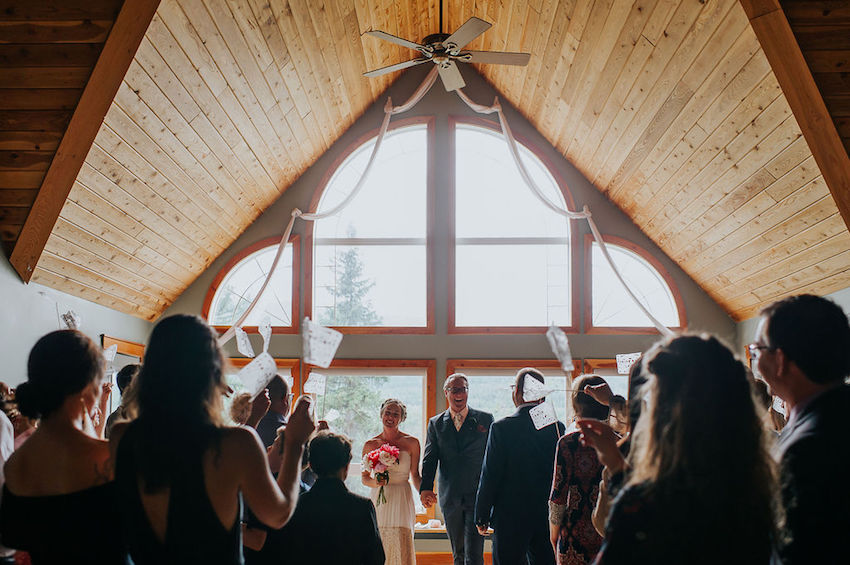Bride and Groom facing guests after wedding ceremony