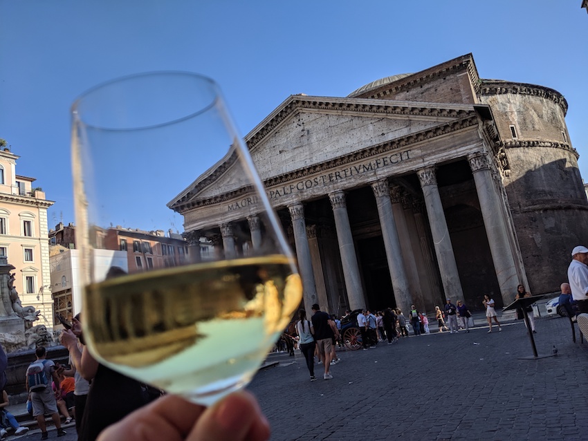 Pantheon in Rome viewed through a glass of white wine