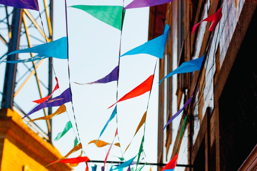 multicoloured bunting against sky